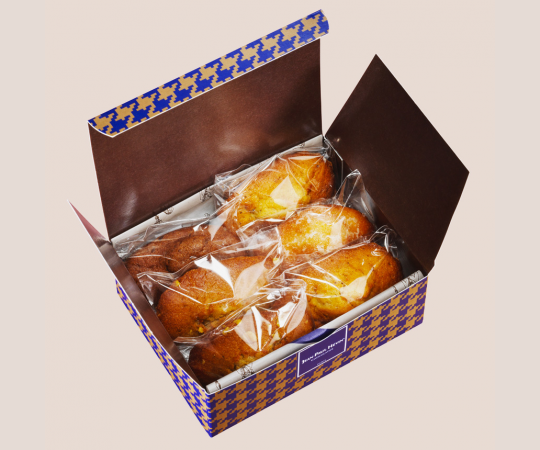 madeleines 2024 chocolat - caramel - pistache - vanille - citron - miel. Boîte ouverte